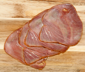 thin slices of Smoked tuna macro food background - 770024334