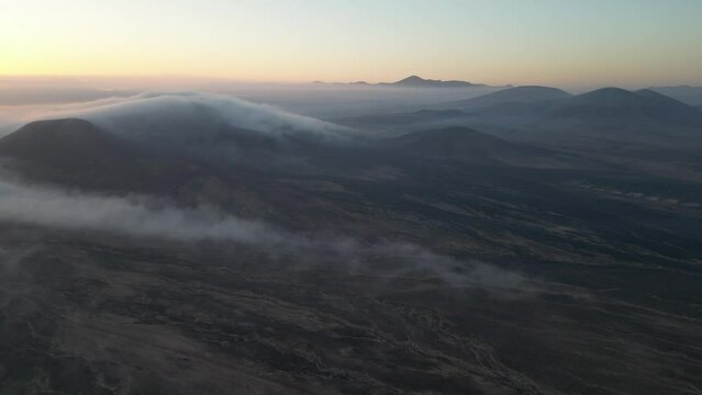 Expansive view of clouds over the dramatic landscape of Fuerteventura, Canary island in spain