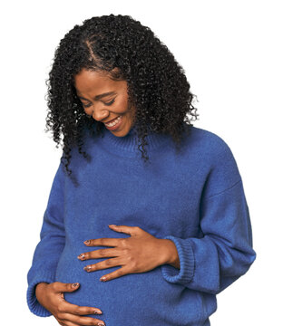 Radiant pregnant African American woman smiling
