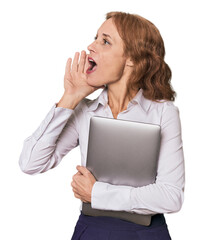 Mid-aged Caucasian with laptop in studio shouting and holding palm near opened mouth.