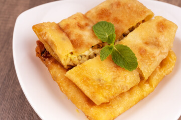 Egg murtabak or martabak Jawa vegetables stuffed pancake