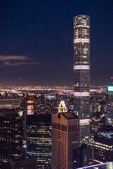 Fototapeta na wymiar The skyline of Midtown Manhattan in the evening in New York City.