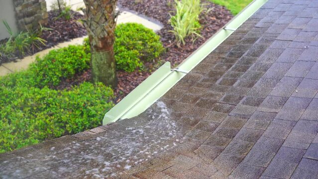 Rain water flowing to gutter of a house	