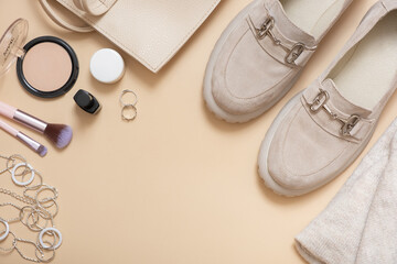 Shopping, fashion blog concept. Top view. Flat lay women's shoes, bag and cosmetics. Copy space