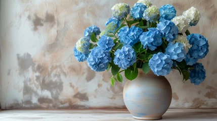 Afwasbaar fotobehang Blue and white hydrangea flowers in vase on wooden table. © Виктория Дутко