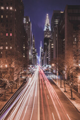 New York City streets at night. Lights and shadows of NYC. Lights of advertising on streets of...