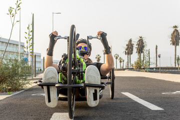 Determined athlete training in adaptive handbike