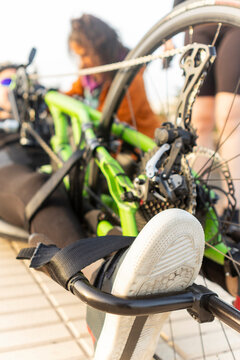 Woman athlete preparing for handbike race
