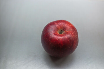 red apple on table