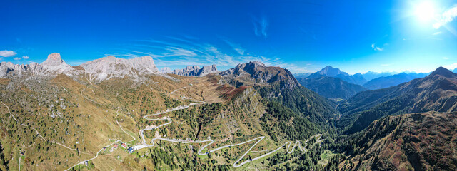 Winding road through the Dolomites Italy - Passo di Giau with Colle Santa Lucia and Selva di Cadore Dolomiti - obrazy, fototapety, plakaty