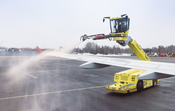 Oslo, Norway: de-icing of an airplane 