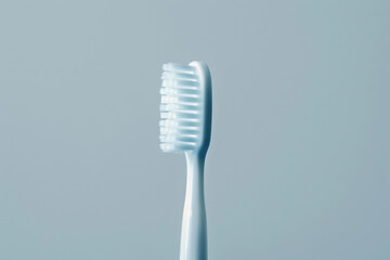 Close Up of Toothbrush on Gray Background