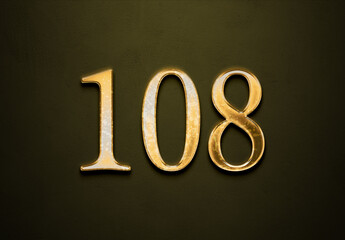 Old gold effect of 108 number with 3D glossy style Mockup. - obrazy, fototapety, plakaty