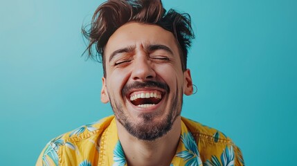 A man smiling on an isolated blue background