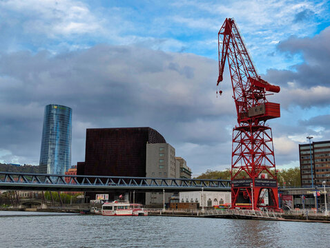 Bilbao, Spain; march 27th 2024: the crane named La Carola, Nervion River and Euskalduna Bridge