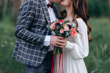 bride and groom kissing each other