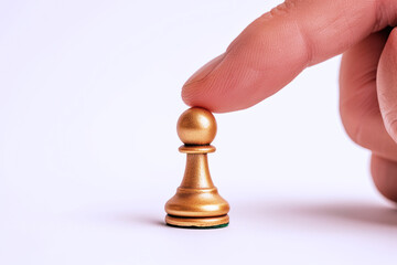 Hand holding gold chess pieces isolated on white, business strategy