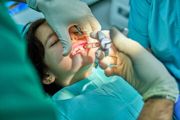 A child receives expert dental care, highlighting the gentle techniques used in pediatric dentistry