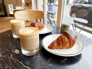 A leisurely breakfast of latte and pastries in a cafe