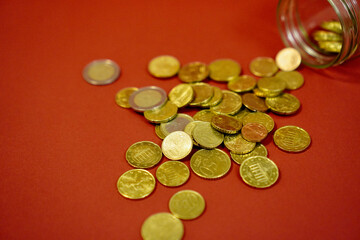 coins on red background