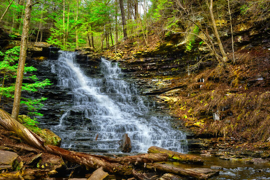 Spring at Ricketts Glen State Park in Benton PA. Known for its 21 waterfalls and old-growth forest and boulders. Hiking the loop on a cold Spring Day.