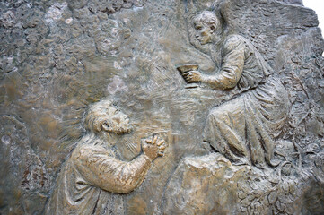 The Agony of Jesus in the Garden – First Sorrowful Mystery of the Rosary. A relief sculpture on Mount Podbrdo (the Hill of Apparitions) in Medjugorje.