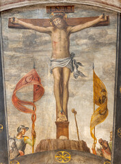MILAN, ITALY - MARCH 7, 2024: The renaissance fresco of Crucifixion - Cappella della Passione in San Giorgio in Palazo church by Bernardino Luini (1516)
