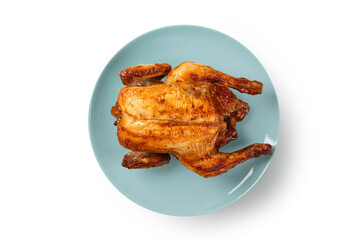 Roasted chicken on a plate on white background. Top view