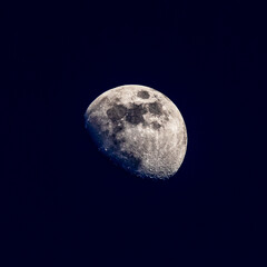 The moon in a waning crescent phase on a spring evening