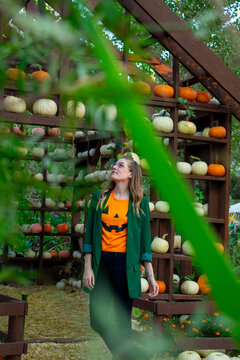 Woman in pumpkin gazebo