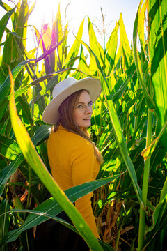 Woman in corn stalks