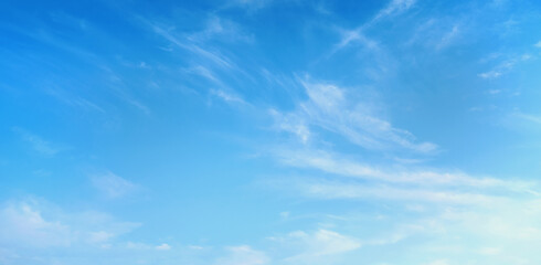 clear blue sky with a few clouds - obrazy, fototapety, plakaty