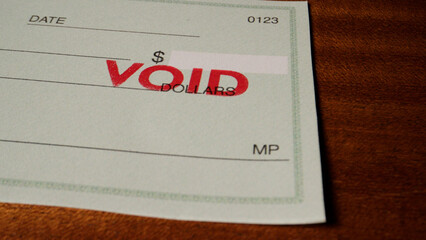 5 photo of blank green generic check on table with void stamp