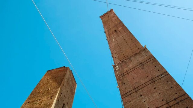 Revealing the Two Towers of Bologna, Garisenda and Asinelli, iconic in Emilia-Romagna, Italy, echo the rich medieval history of the city