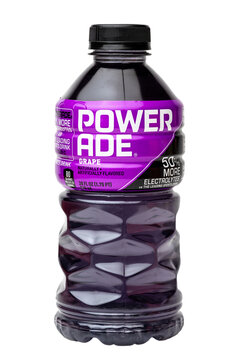 Isolated Bottle of Powerade brand grape sport drink on transparent background	
