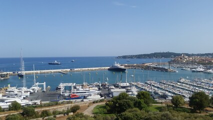 Fototapeta na wymiar Moored boats in Antibes Vauban Harbor ( Le quai des milliardaires ) - French Riviera - South of France