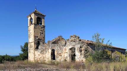 Fototapeta na wymiar A ruined church its bell tower leaning to one side and its walls marred by deep cracks.