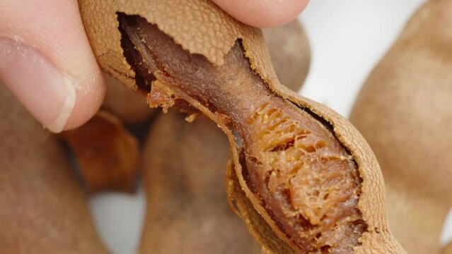 Cleaning tamarind, top view, close-up.