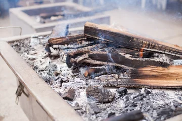 Wandaufkleber Photograph of wood burning on top of a furnace called "China Box".  © artrolopzimages