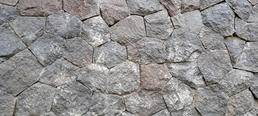 Stone wall texture. Old castle wall texture background. Stone wall as background or texture. Part of a stone wall, for background or texture