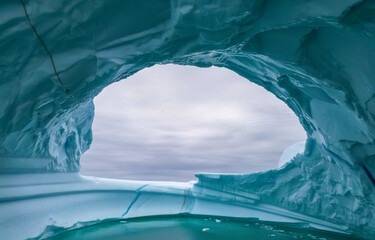 Ice cave. iceberg in the sea