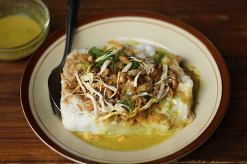 Chicken Porridge with yellow soup. 