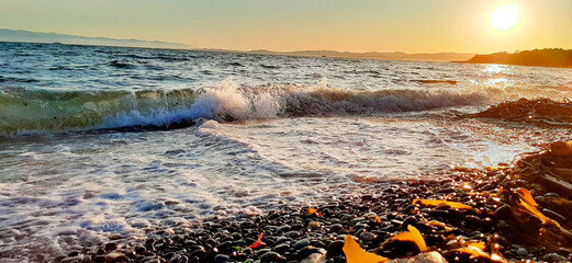 Waves on the beach at sunset 3