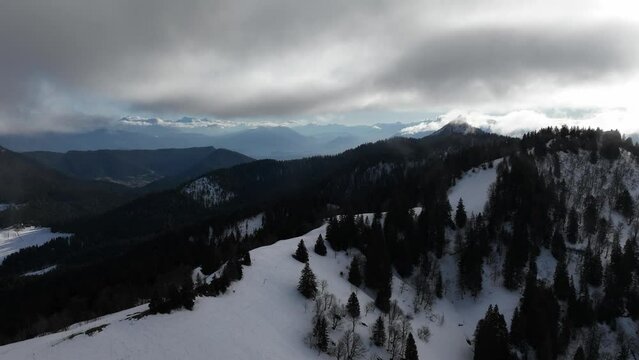 Timelapse of large horizon of mountains with snow summit and clouds, French Alps