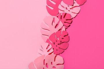 Composition with paper palm leaves on color background