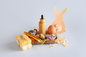 Composition with spa supplies and Easter decor on grey background - obrazy, fototapety, plakaty