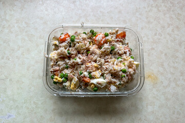 Homemade rice salad with vegetables and tuna
