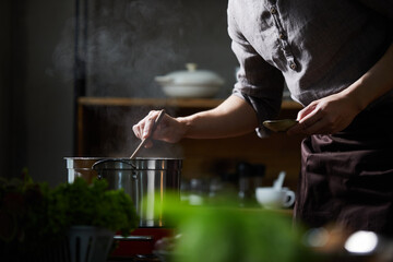 Cook making dishes in the kitchen