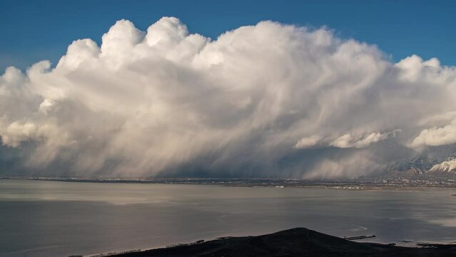 Timelapse of storm moving over Provo and Orem across Utah Lake as weather pattern moves through the valley.
