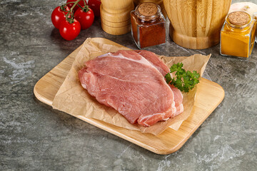 Raw pork schnitzel for cooking